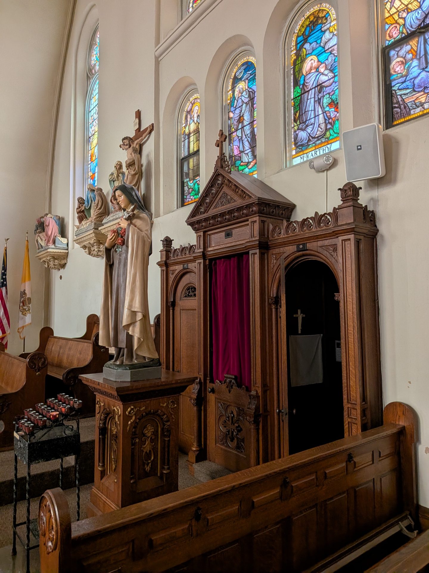 Saint Anthony (Watkins) (05) - Saint Therese & confessionals (side) A photo of the confessionals of Saint Anthony parish in Watkins, MN